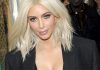 Kim Kardashian Shows Off Deep Cleavage As She Leaves UK After Visit kim kardashian celebrity