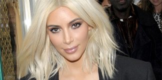 Kim Kardashian Shows Off Deep Cleavage As She Leaves UK After Visit kim kardashian celebrity