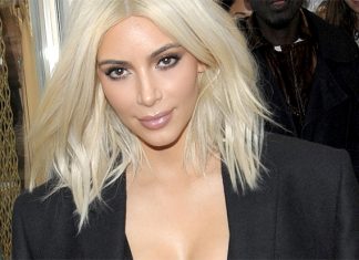 Kim Kardashian Shows Off Deep Cleavage As She Leaves UK After Visit kim kardashian celebrity