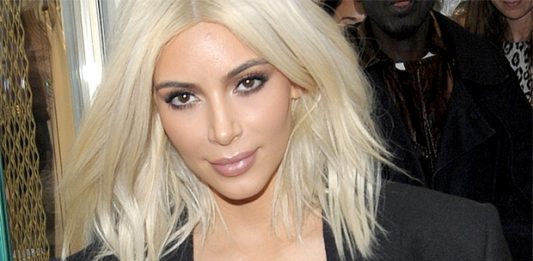 Kim Kardashian Shows Off Deep Cleavage As She Leaves UK After Visit kim kardashian celebrity