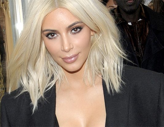 Kim Kardashian Shows Off Deep Cleavage As She Leaves UK After Visit kim kardashian celebrity