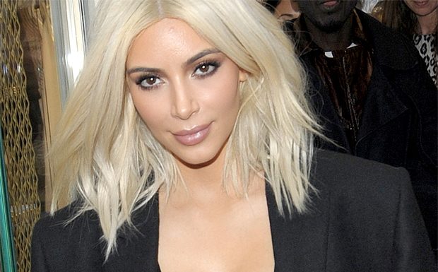 Kim Kardashian Shows Off Deep Cleavage As She Leaves UK After Visit kim kardashian celebrity