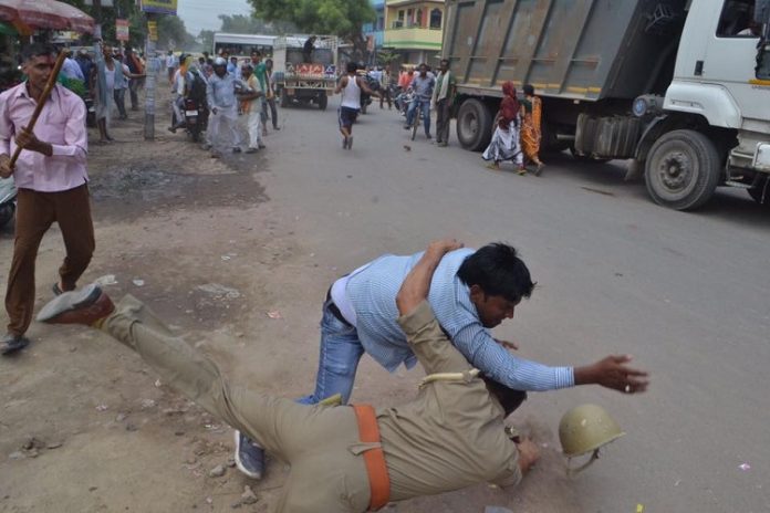 policemen thrashed