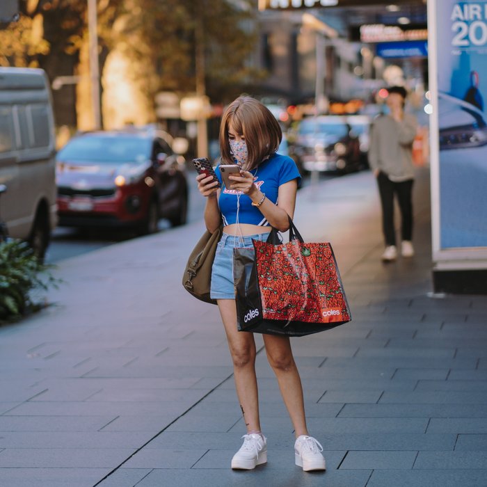 Busy texting with mask on