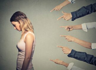 Are You On A Guilt Trip? Check The Warning Signs And How To Resist It Side profile sad upset woman