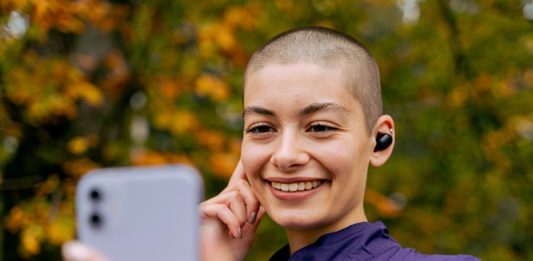 Best Course Of Therapy For Brain Cancer | 08 June, The World Brain Tumor Day A Smiling woman