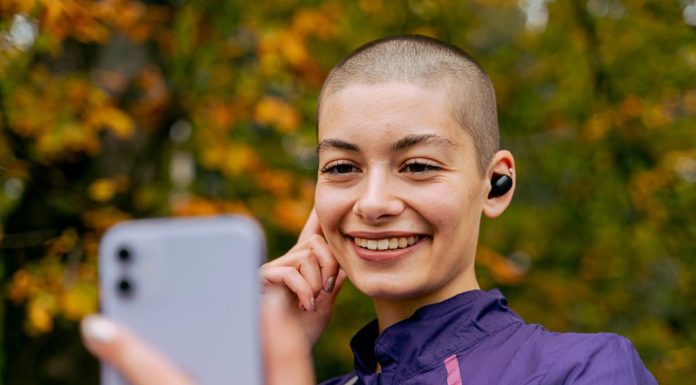 Best Course Of Therapy For Brain Cancer | 08 June, The World Brain Tumor Day A Smiling woman