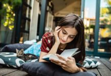 List Of Must Read Books That No Book Lover Can Afford Missing Out | N4M Review Young Book Lover Enjoying a Must Read Book