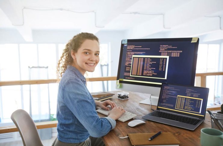 IT Developer Reading Code - Jobs and Careers