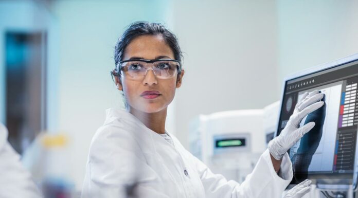 Crosscope & BALCO Join Hands To Focus On Effective Cancer Diagnosis Via AI Enabled Platform Doctor Working in Lab