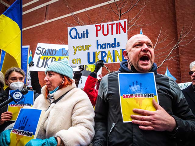 Protesters chanting "Save Ukraine"