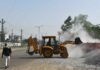 ‘Making Ends Meet’ More Important For Indian Workers Than Worry About Toxic Air Risks Driver Picks Up Gravel