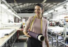 5 Essential Services For Your Manufacturing Business Smiling woman manufacturing business