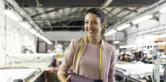 5 Essential Services For Your Manufacturing Business Smiling woman manufacturing business