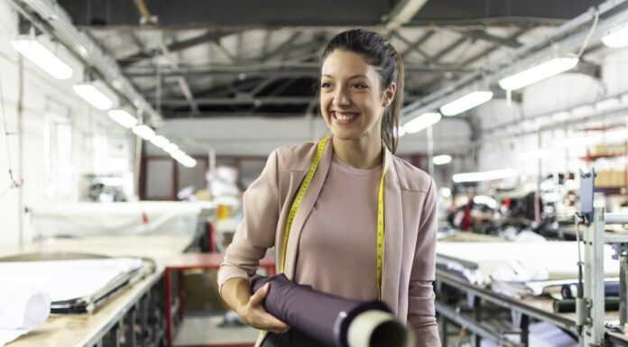 5 Essential Services For Your Manufacturing Business Smiling woman manufacturing business
