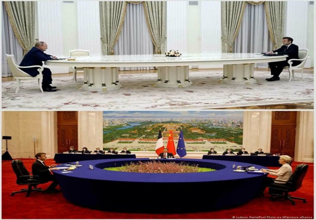 Putin in a meeting (above)