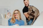 Allergies And Sensitivities In Pets: Identifying And Managing Triggers Woman selfies with husband and pet