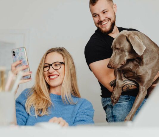 Allergies And Sensitivities In Pets: Identifying And Managing Triggers Woman selfies with husband and pet